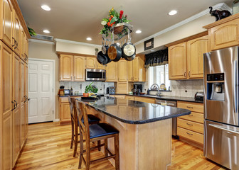 Wall Mural - Kitchen room interior in Luxury home with maple cabinets.