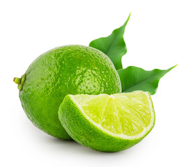 Whole and slice of lime with leaves