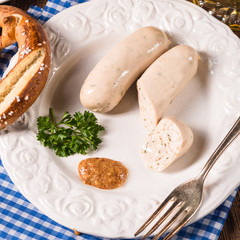 Wall Mural - Bavarian sausage with pretzel, sweet mustard and beer