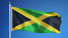 Jamaica Flag Waving Against Clean Blue Sky, Close Up, Isolated With Clipping Path Mask Alpha Channel Transparency