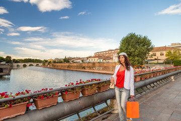 Wall Mural - woman walking on bridge