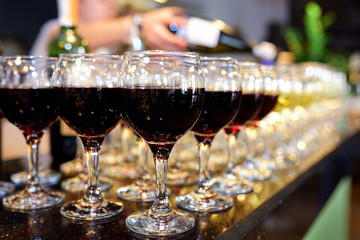 Wine glasses on a buffet table in a restaurant