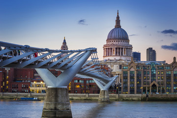 Wall Mural - London, UK - The world famous Millennium Bridge at sunset