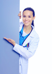 A female doctor with a blank billboard.