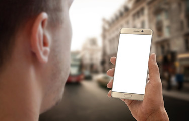 Aufkleber - Man holding phone on city street. Isolated white display for mockup.