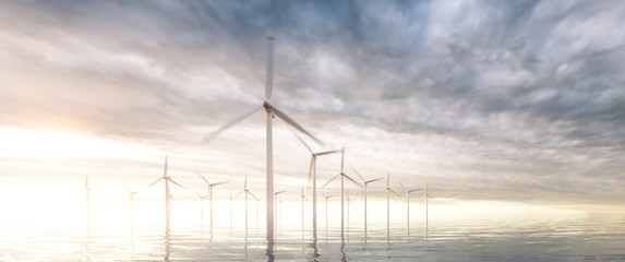 Wall Mural - image of coastal wind park with sunset stormy sky