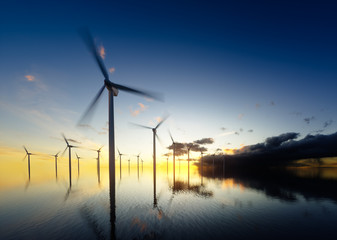 Wall Mural - offshore wind turbines at daybreak