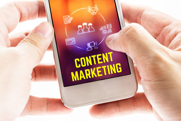Poster - Close up Two hand holding mobile phone with Content marketing wo