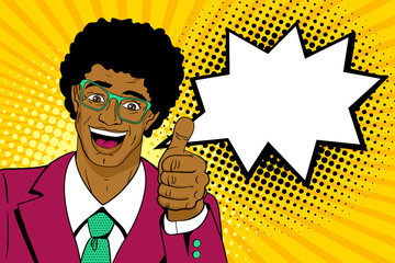Wall Mural - Wow pop art man. Happy young surprised african man in glasses and suit shows thumb up with open mouth, afro hairstyle and speech bubble. Vector cartoon background in pop art retro comic style. 
