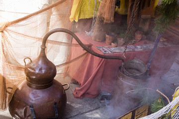 recreation of an old brass alembic for the production of alcoholic beverages