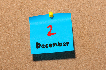 December 2nd. Day 2 of month. Calendar on notice board. Winter time. Empty space for text