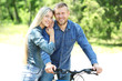 © Africa Studio - Happy couple with bicycle in park