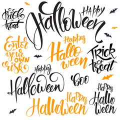 Wall Mural - vector set of hand lettering halloween quotes - happy halloween, trick or treat and others, written in various styles