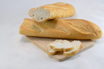 Fresh bread with slice