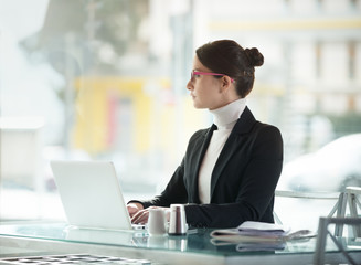 Busy woman working on her laptop