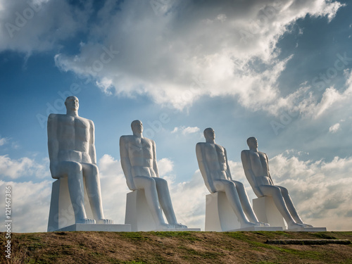Men at sea colossal sculptures near Esbjerg harbor in Denmark Wallpaper Mural