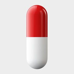 Single red medical capsule, pill, isolated on white. 