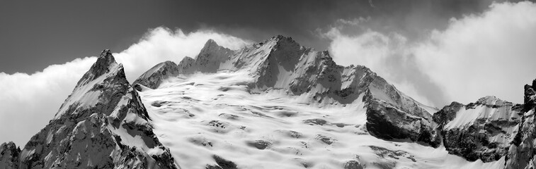 Black and white panorama of winter mountains