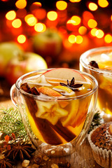 Wall Mural - Mulled  apple cider with added spices and citrus. A delicious and warming hot drink perfect for autumn and winter evenings