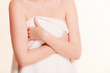 © anetlanda - Woman covering breast under towel.
