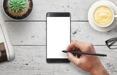 Aufkleber - Draw with pen on isolated white mobile phone display. Coffee, plant, glasses, newspaper beside.