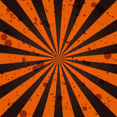 Wall Mural - Grunge sunbeam background in Halloween traditional colors. Orange and black sun rays abstract wallpaper.