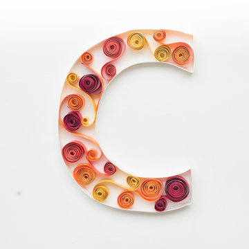 Letter from flower inspired quilling alphabet. isolated