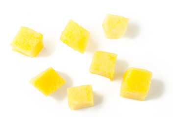 Poster - Mango slice cut to cubes isolated on white background