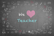 We love teacher message on black chalkboard with doodle free hand sketch chalk drawing on the frame: Teachers day concept: Students sending love message to school teacher on special occasion