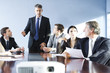 © PhotoAlto - Corporate trainer leading training session