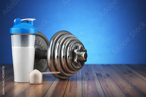 Fotografia Dumbbell and whey protein shaker. Sports bodybuilding supplement