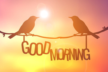 Silhouette bird and good morning word