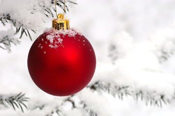 Christmas ball with snow and frost