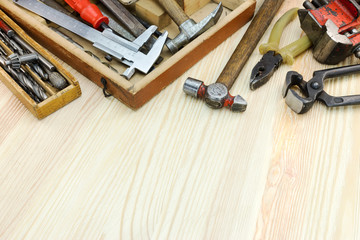 Sticker - set of various old tools and instruments for construction and repair on wooden background