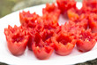 Nicely flower sliced tomatoes on plate