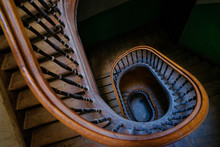 Shape, Architecture And Perspective. Beautiful Old Wooden Spiral Staircase.