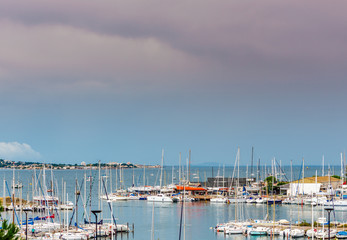 Wall Mural - Ciel d'orage au port de Balaruc les bains en Occitanie, France