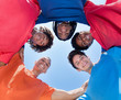 Group of mixed race male young adults in a circle