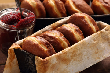 Donuts with jam. Traditional Polish cookies on Fat Thursday