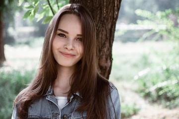 portrait of a beautiful girl closeup on street 