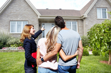 Sticker - Real Estate agent woman with clients near new house.