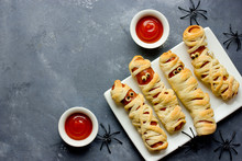Halloween Background. Funny Sausage Mummies With Ketchup For Halloween