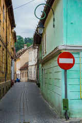 Canvas Print - Narrow street in Brasov city in Romania