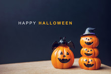 Happy Halloween Message, Pumpkin On Table Wood With Dark Wall Background, Halloween Concept.