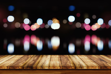 Sticker - Empty wooden table with bokeh abstract light background.