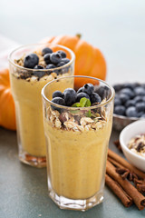 Wall Mural - Pumpkin smoothie with granola and berries