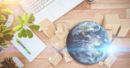 Poster - Composite image of globe and cardboard boxes