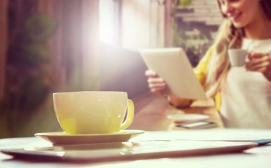 Poster - Composite image of cup of coffee and tablet pc