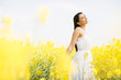 © BGStock72 - Young woman in the spring field