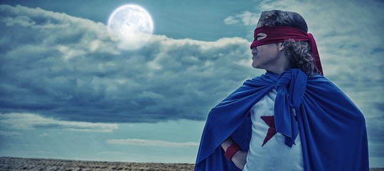 Poster - Composite image of boy wearing superhero costume 
